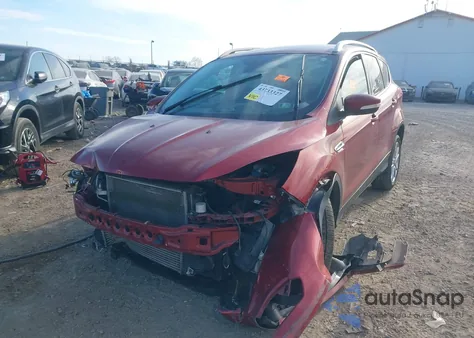 2016 Ford Escape Titanium z USA, uszkodzony, nr VIN 1FMCU9J91GUA90034